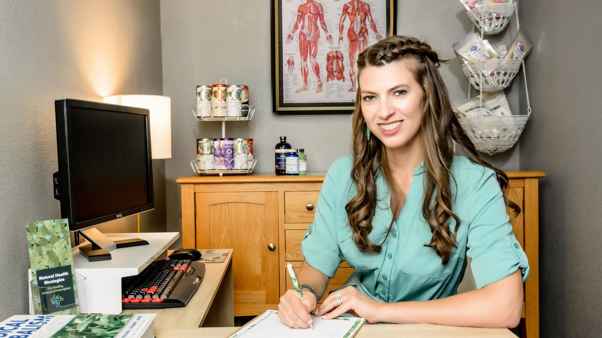 natural health strategies rebecca in her office